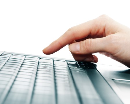 Hand over computer keyboardの写真素材