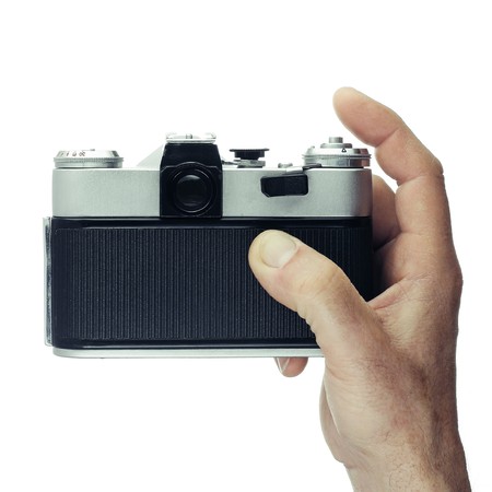 Retro camera in handの写真素材