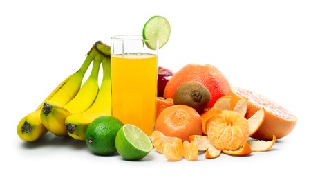 Collection of a ripe tropical fruits isolated over white backgroundの写真素材
