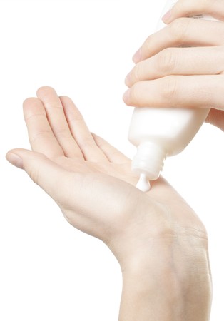 Hands with bottle and care creamの写真素材