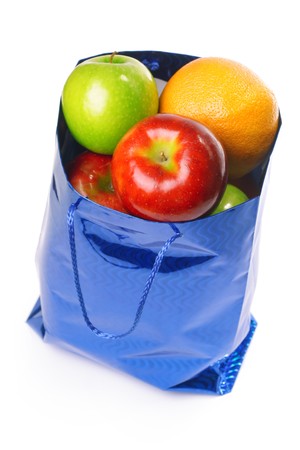 Bag with fruits isolated on white backgroundの写真素材