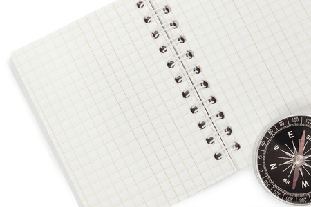 Compass and notebook isolated on whiteの写真素材