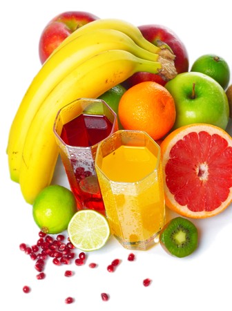 Tropical wet fruits with glasses on white backgroundの写真素材