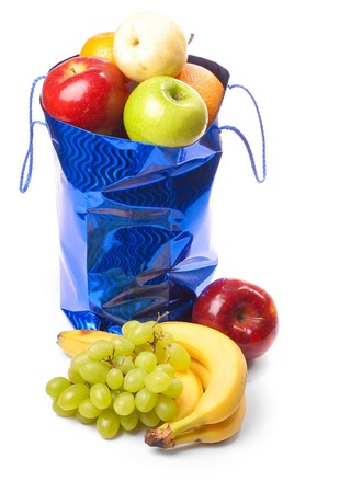 Bag with fruits isolated on whiteの写真素材