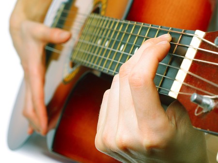 Acoustic guitar with hands