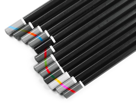 Black pencils with colored tips over whiteの写真素材