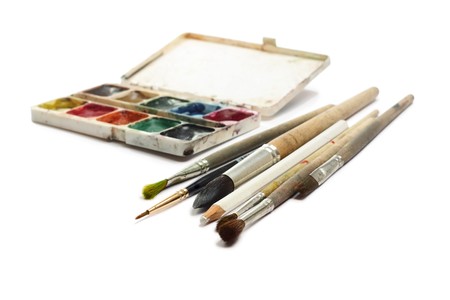 Brushes and water paints on white backgroundの写真素材