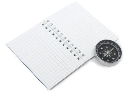 Blank notebook with compass isolated over whiteの写真素材