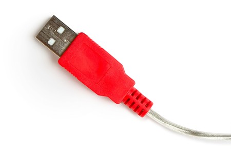 Red usb connector over whiteの写真素材