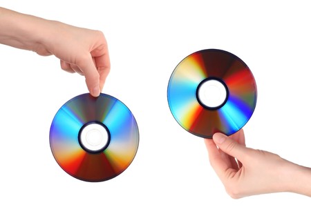 Compact discs in handsの写真素材