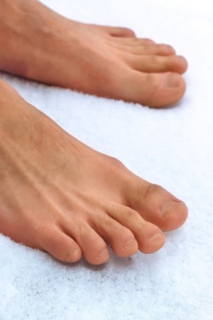 feet on snow surfaceの写真素材