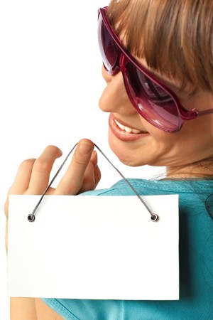 Smiling girl with blank paperの写真素材
