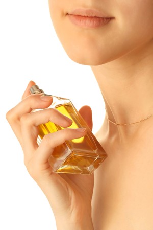 Young woman with perfume bottleの写真素材