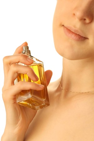 Young woman with perfumeの写真素材