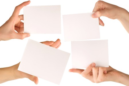 Hands with blank papersの写真素材