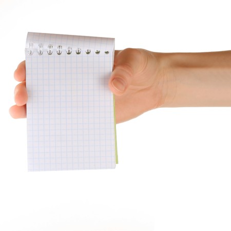 Blank notebook in handの写真素材