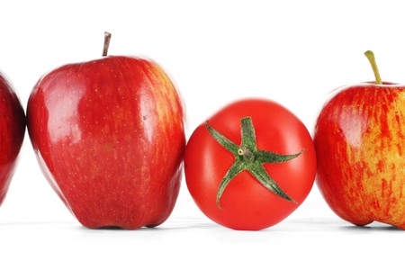 Red apples and tomatoの写真素材