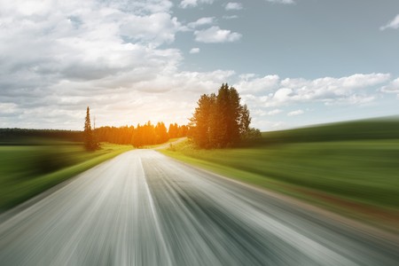 Asphalt blurry road on rural landscapeの写真素材