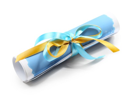 Roll paper letter with ribbons on whiteの写真素材