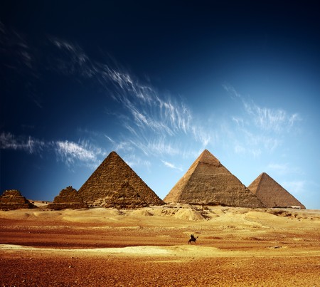 Giza valley with Great pyramids and blue sky with clouds