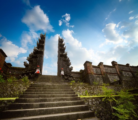 Hindu temple Pura Agung on blue sky backgroundの写真素材