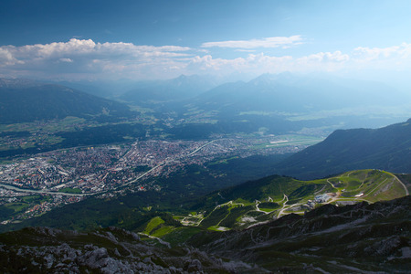 Shot of the city of Innsbruk from top of mountain at sunny dayの写真素材