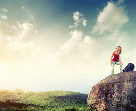 Hiker on the rockの写真素材