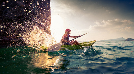 Woman with the kayakの写真素材