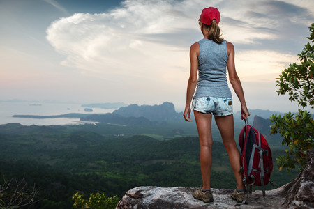 Hiker on the cliffの写真素材