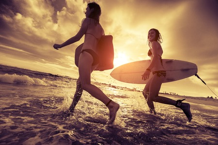 Surfers with boardsの写真素材