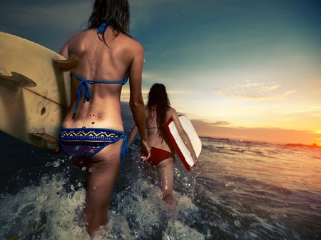 Surfers with boardsの写真素材