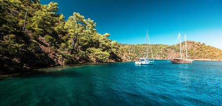Yachts in the Bay in the mountainsの写真素材