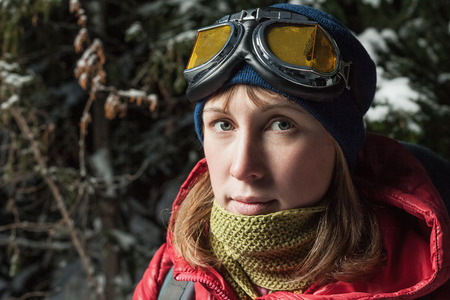Close up of young woman with goggles looking to a cameraの写真素材
