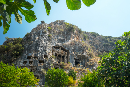 Fethiye rock tombs - 4th BC tombs carved in steep cliff. City of Fethiye, Turkey.の写真素材