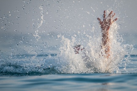 Person drowns in the seaの写真素材