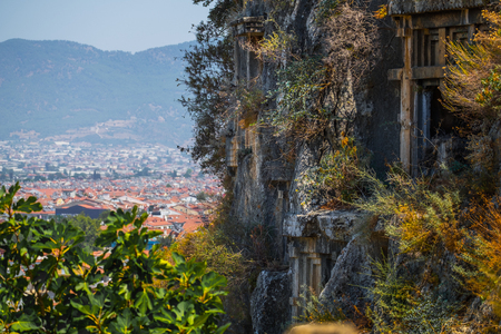 Amyntas rock tombs - 4th BC tombs carved in steep cliff. City of Fethiye, Turkey.の写真素材