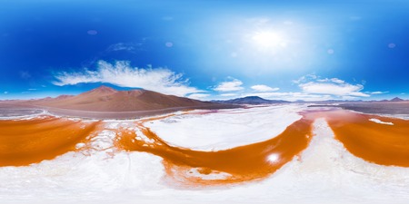 Spherical, 360 degrees, seamless aerial panorama of the Laguna Colorada with orange water and white salt fields and salt islets. Lake is located in Eduardo Abaroa Andean Fauna National Reserve, Boliviaの写真素材
