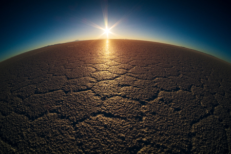 Salar de Uyuni salt flat with cell patterns during sunrise, Boliviaの写真素材