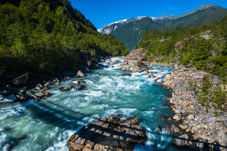 Rapid river in Patagonian mountains, valley of the Quelat National Park, Chileの写真素材