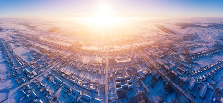 Aerial view of a Russian village during winterの写真素材
