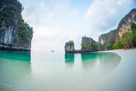 Beach and calm sea on the tropical island of Hong at early morning, Thailandの写真素材
