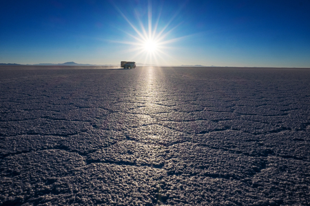 Salar de Uyuni at sunrise. Salt flat of the Salar de Uyuni during sunrise, Boliviaの写真素材