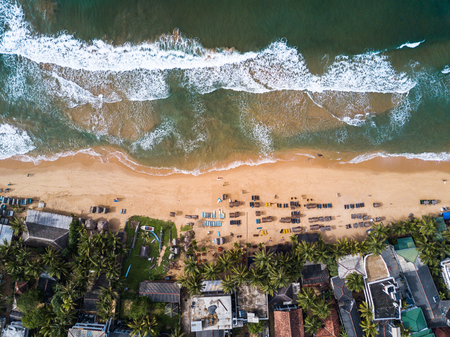 Aerial view of the tropical beach in the town of Hikkaduwa, Sri Lankaの写真素材