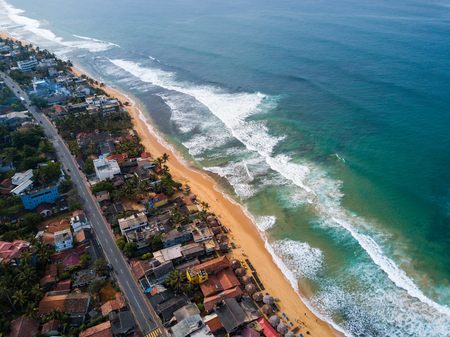 Aerial view of the beach in the town of Hikkaduwa, Sri Lankaの写真素材