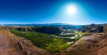 Panorama of the snow caped Northen Chuysky Range and green valley of the river of Chuya. Altai Republic, Russiaの写真素材