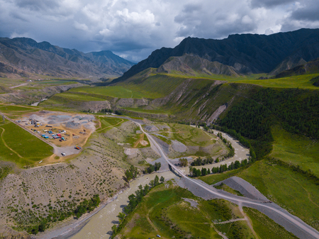view of the road and bridge across the river of Chuya. Altai, Russiaの写真素材