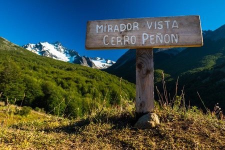 Sign in Chilean mountains with ice caped mountain on the backgroundの写真素材