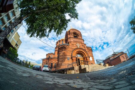 NOVOSIBIRSK, RUSSIA - 11 AUGUST 2018: Alexander Nevsky Cathedral and its yard. Church is one of the first stone constructions in Novonikolayevsk (former name of Novosibirsk)のeditorial素材