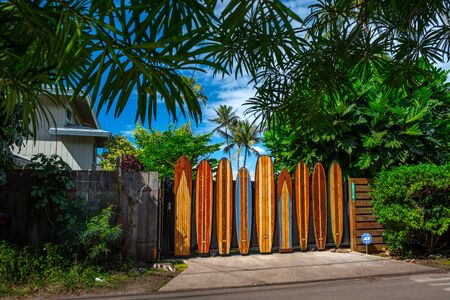 OAHU / USA - 09 JANUARY 2019: Fence of the property made of the decorative colorful surf boards, located near the famous Pipeline surf spot on the North Shore of Oahuのeditorial素材