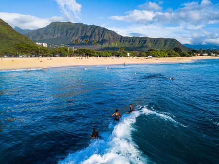 OAHU / USA - 17 NOVEMBER 2018: Aerial view of the surfers having fun on small waves. Oahu, Hawaiiのeditorial素材